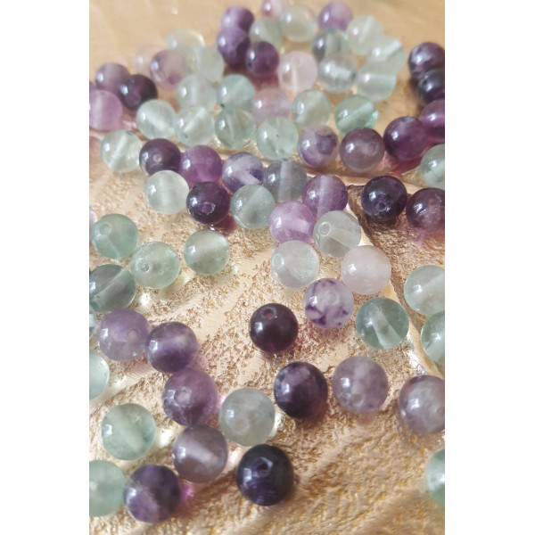 Fluorite - perle ronde percée de 6 mm (violet et vert)