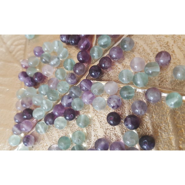 Fluorite - perle ronde percée de 6 mm (violet et vert)